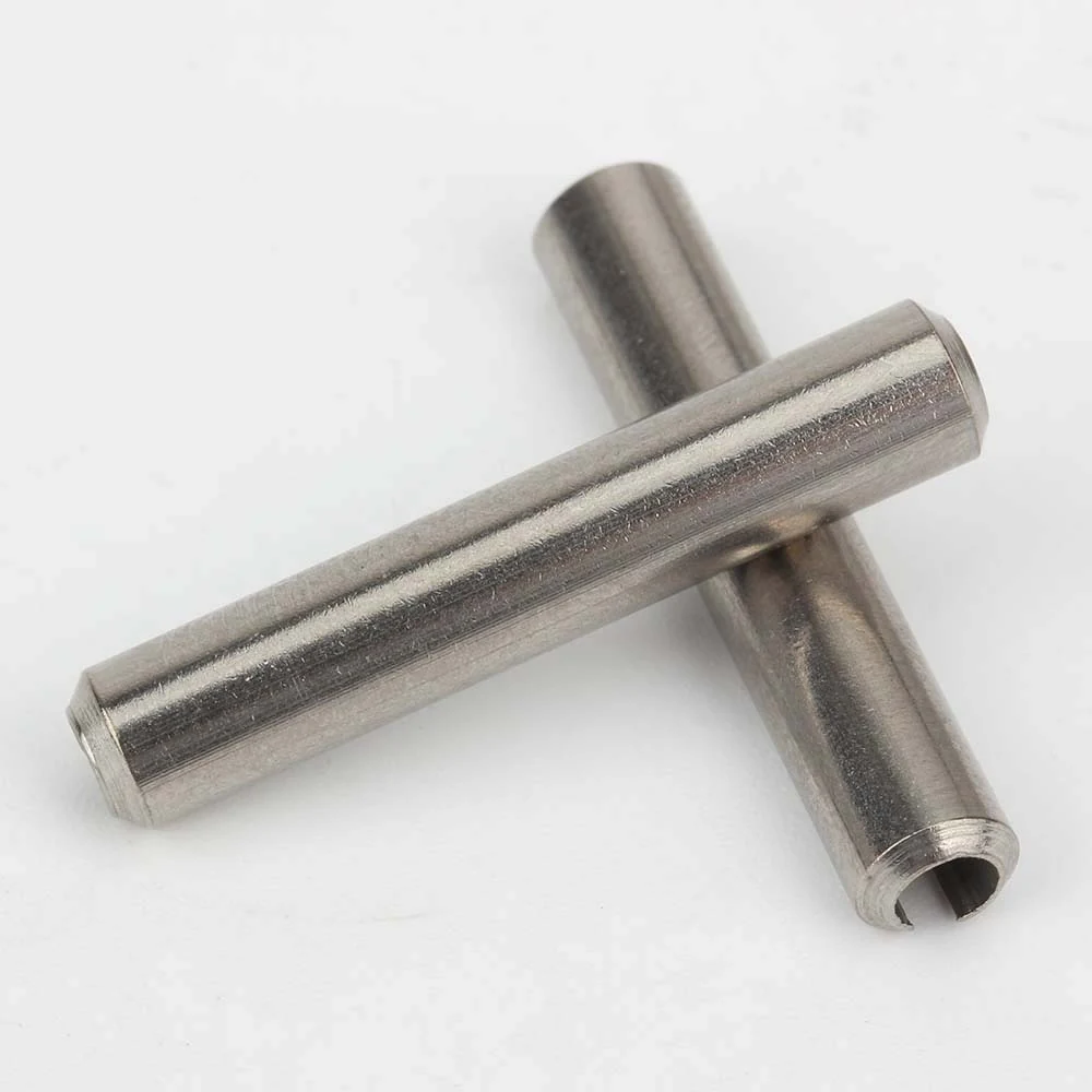 Pair of GB 879 slotted spring pins showing cylindrical bodies and open ends
