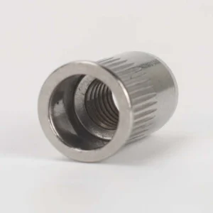 Small countersunk open-end rivet nut with a knurled round body