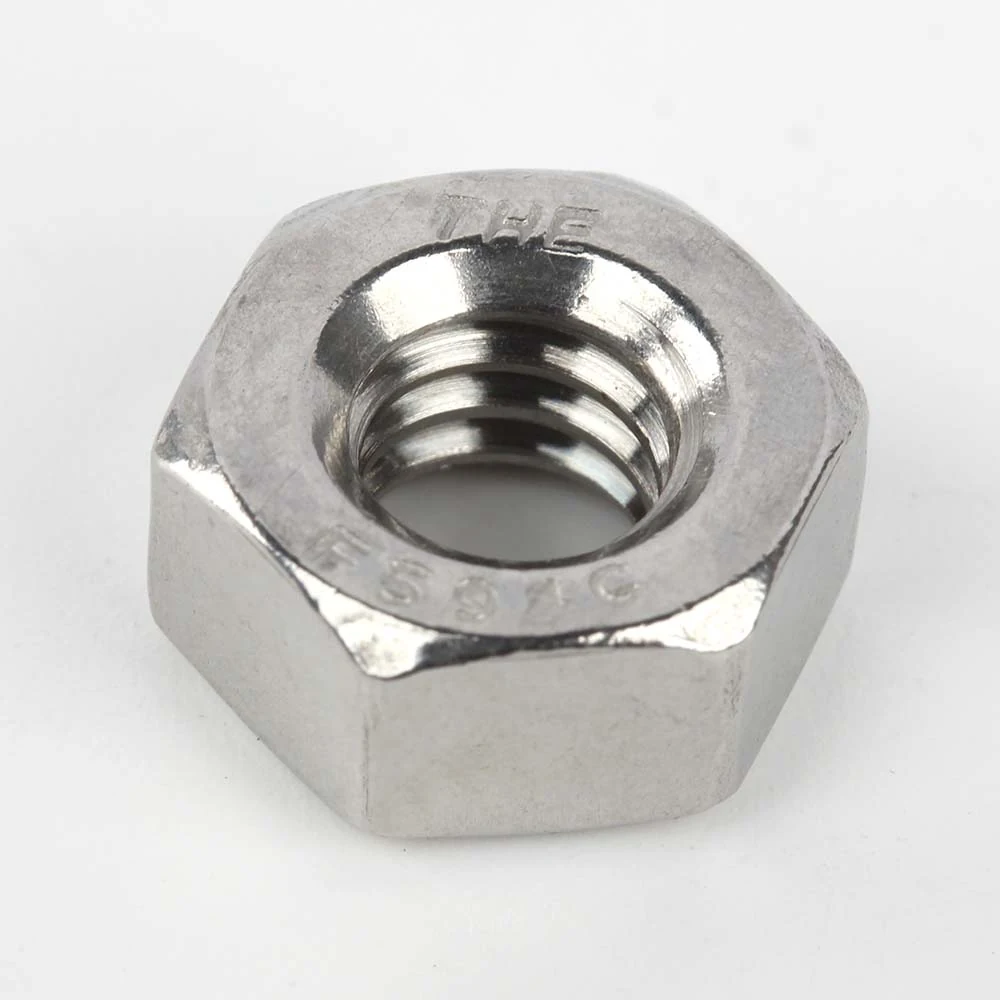 Stainless steel regular hex nut with THE F594C marking and internal thread