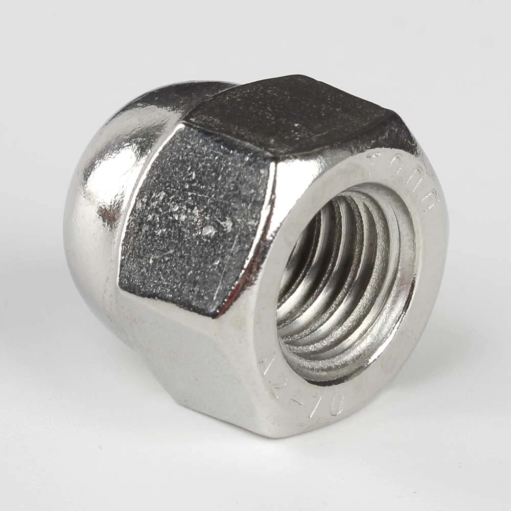 DIN 1587 stainless steel hex cap nut showing the internal thread and TONG A2-70 marking