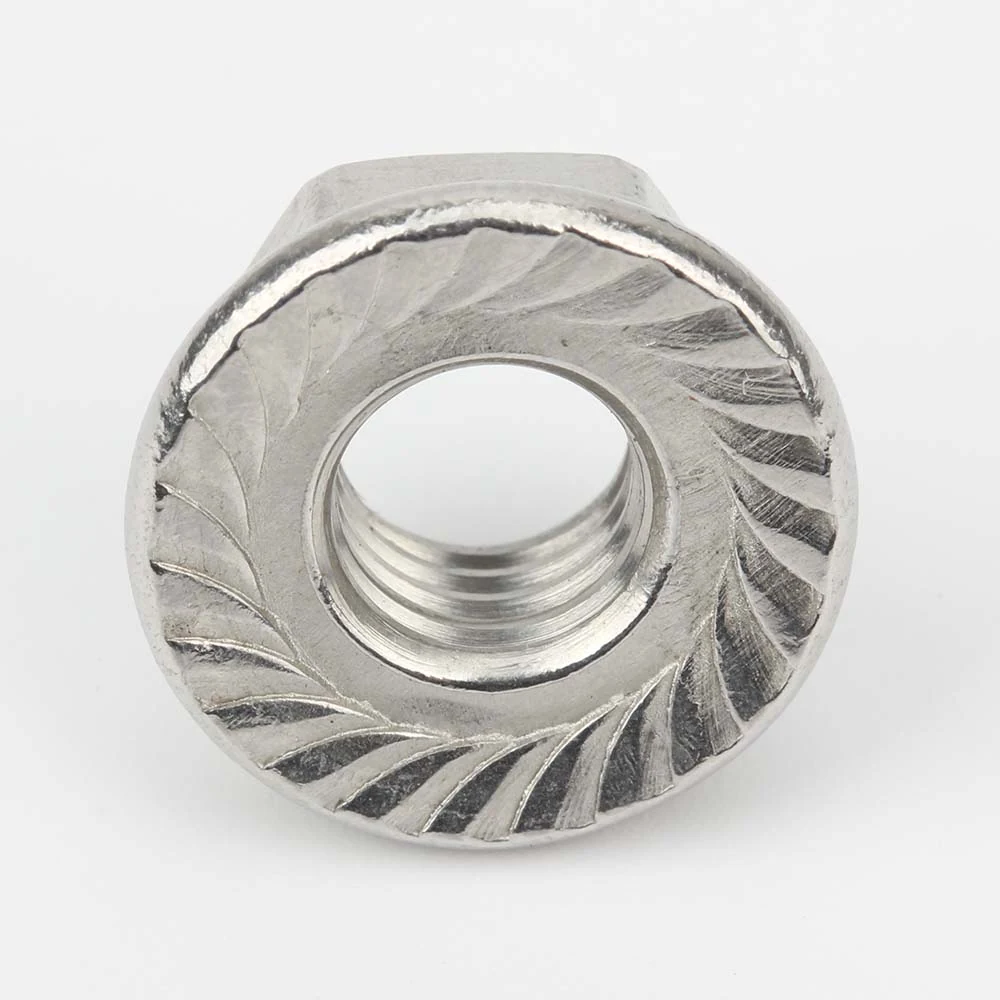 Serrated bearing face and internal thread of a DIN 6923 stainless steel flange nut