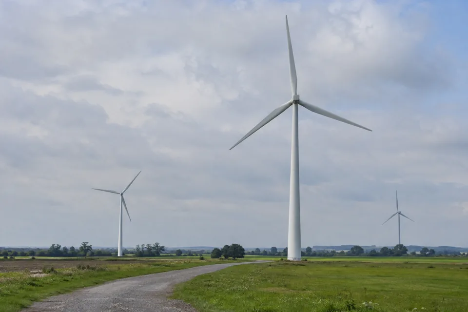 Three-bladed wind turbines in an onshore wind farm