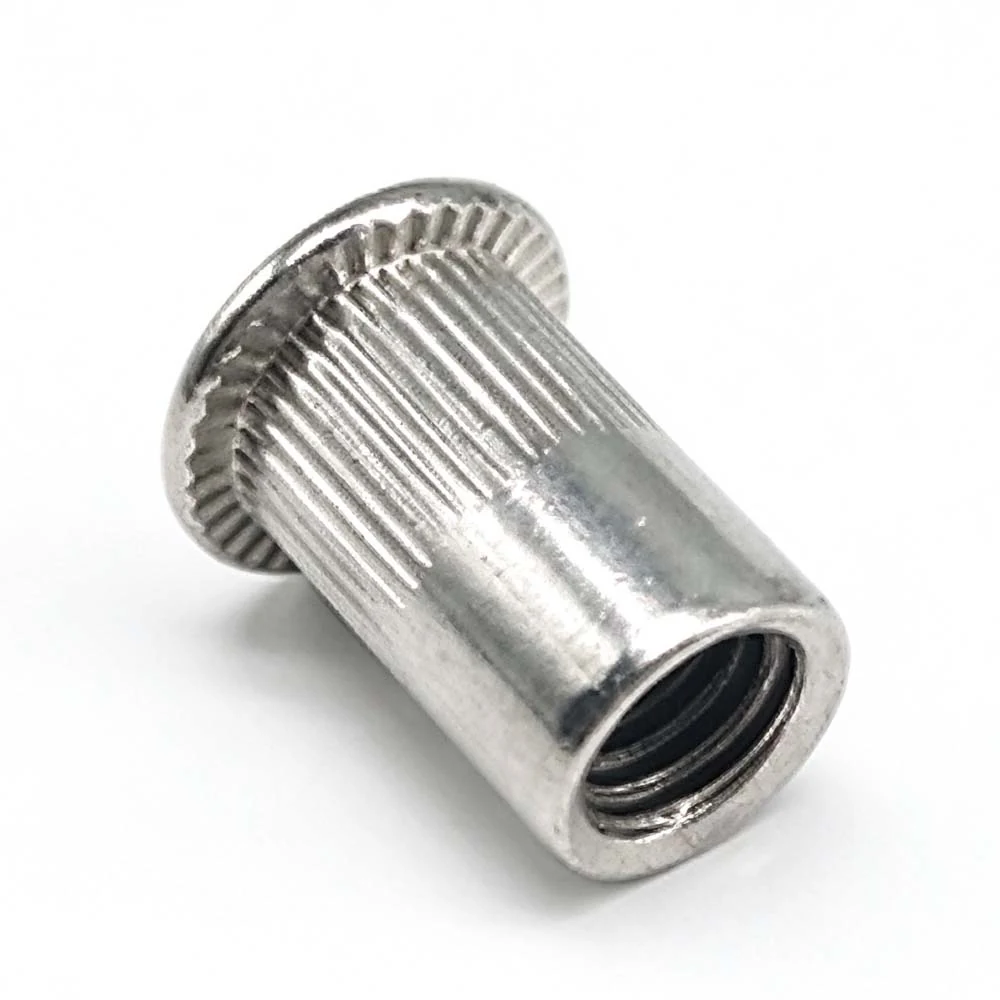 Open-end flat-head knurled round-body rivet nut showing the open threaded end